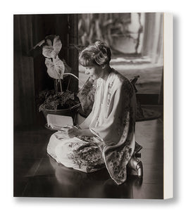 Amelia Earhart in a Kimono Robe, Reading a Book, Waikiki, 1935