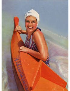 Color photograph of a woman in a striped swimsuit and white bathing cap half submerged in water and holding onto a bright orange canoe.