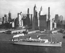 Load image into Gallery viewer, Black and white photograph of a Matson Line cruise ship sailing in the water with New York city buildings in the background.