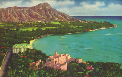 Colorful illustrated aerial view of Waikiki Beach and Diamond Head crater in the background and in the foreground, the pink Royal Hawaiian Hotel and light green Moana Hotel set amongst a lush tropical landscape and blue ocean on the right side.